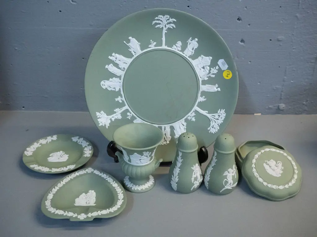 assorted Wedgwood green jasperware including cabinet plate, salt & pepper, lidded trinket, small urn vase etc. Plate is Image 1++