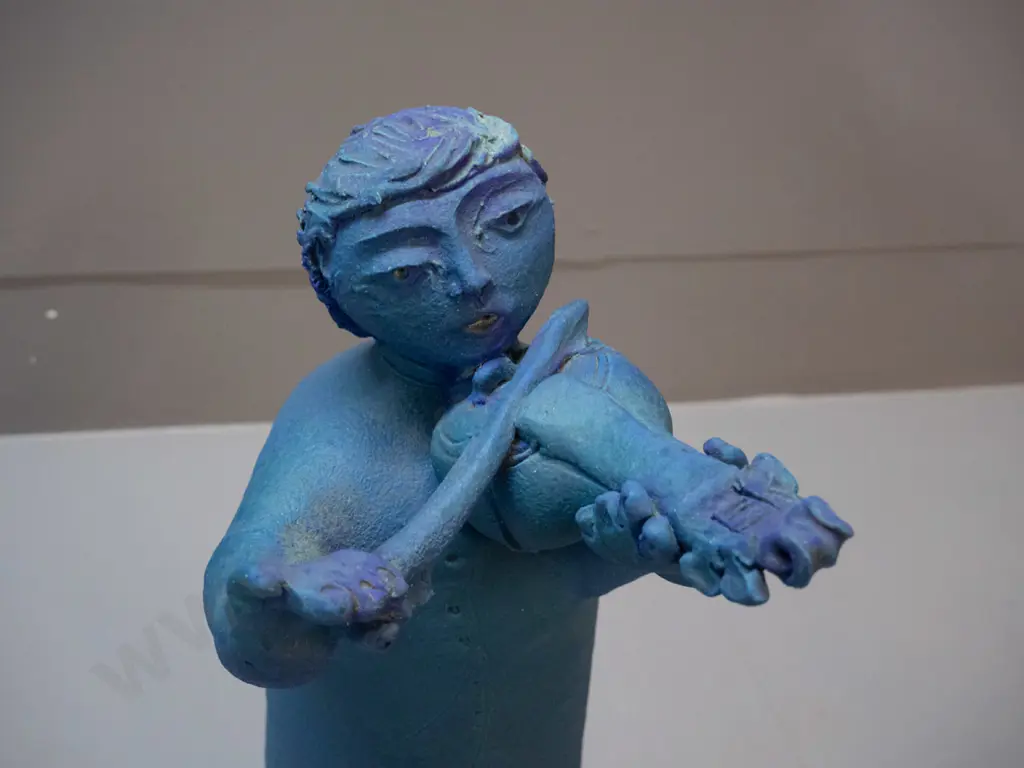 Paul Laird 2002 - Nelson NZ art pottery figure of a man playing mandolin H-380 Image 1++