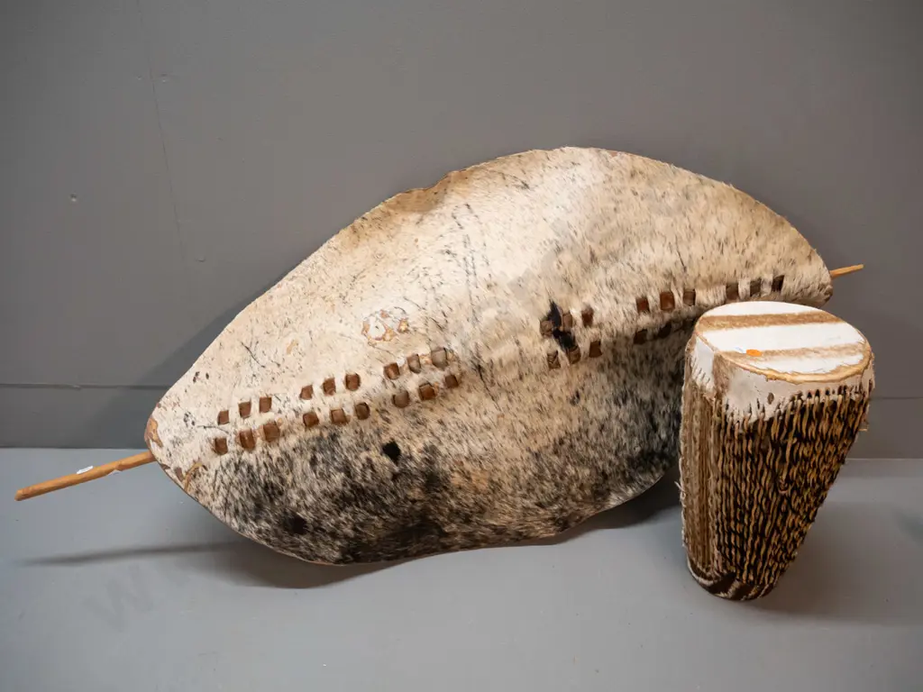 African animal hide and timber shield L-1000 W-460 and small drum Image 1++