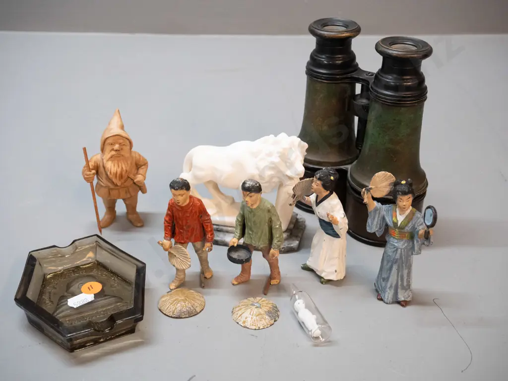assorted small collectables - carved stone lion on marble base, 4 cast metal asian figures, vintage binoculars, carved Image 1++
