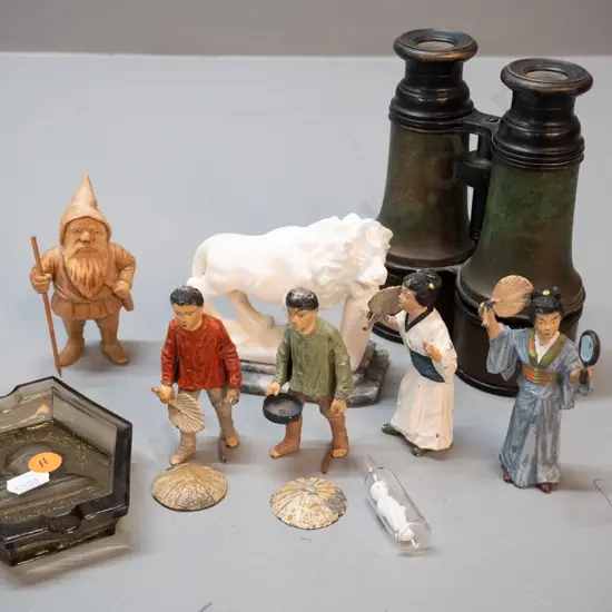 assorted small collectables - carved stone lion on marble base, 4 cast metal asian figures, vintage binoculars, carved
