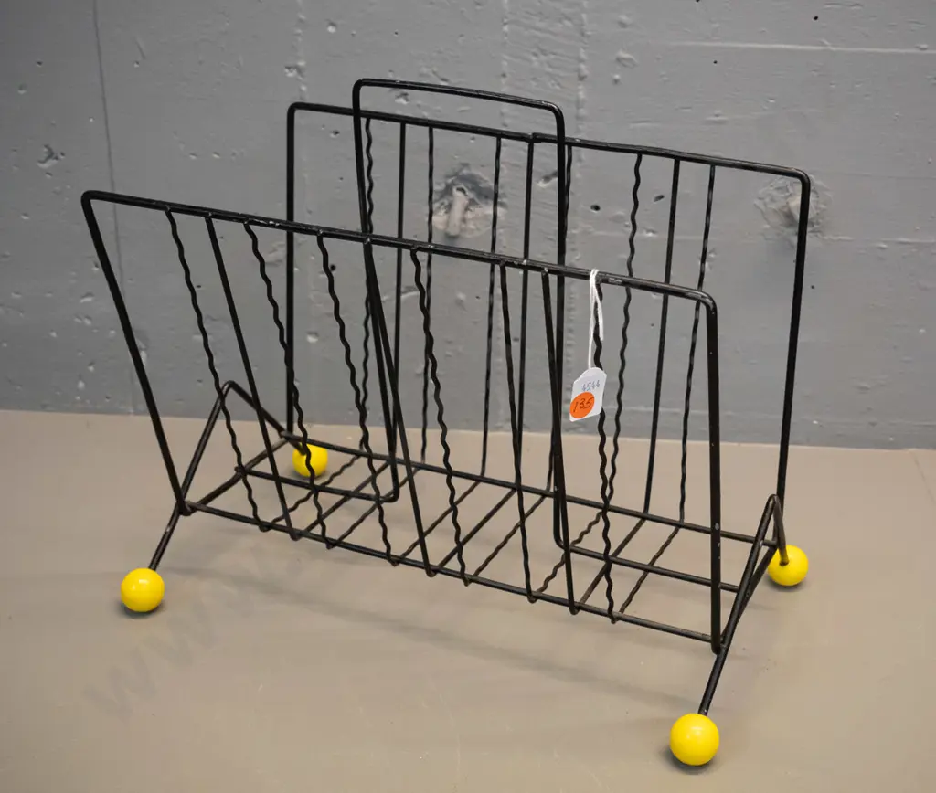 mid-century metal magazine rack with yellow ball feet - some flaking to black paint H-350 L-370 W-230 Image 1++