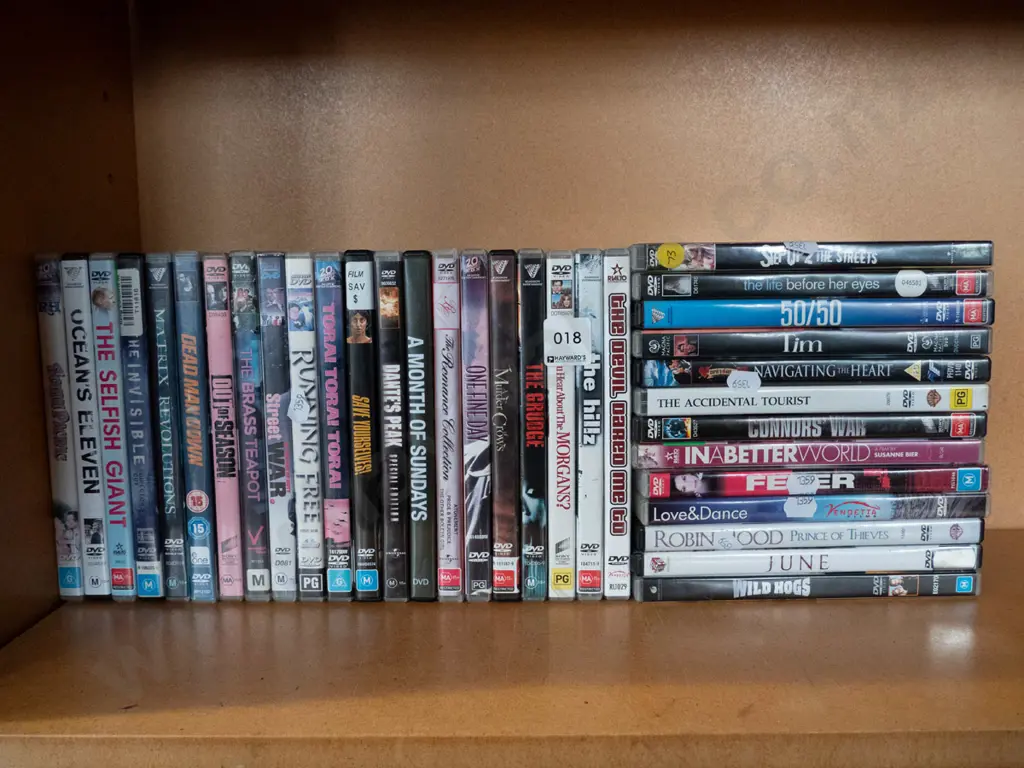 shelf of DVDs Image 1++