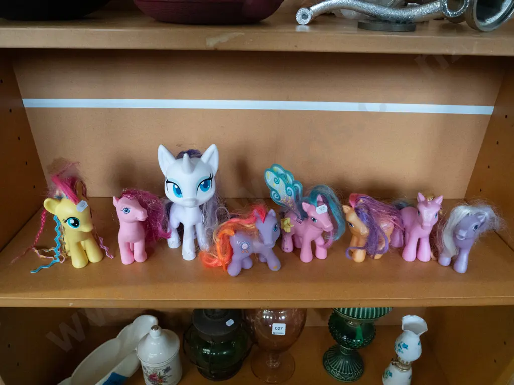 shelf of My Little Pony figures Image 1++
