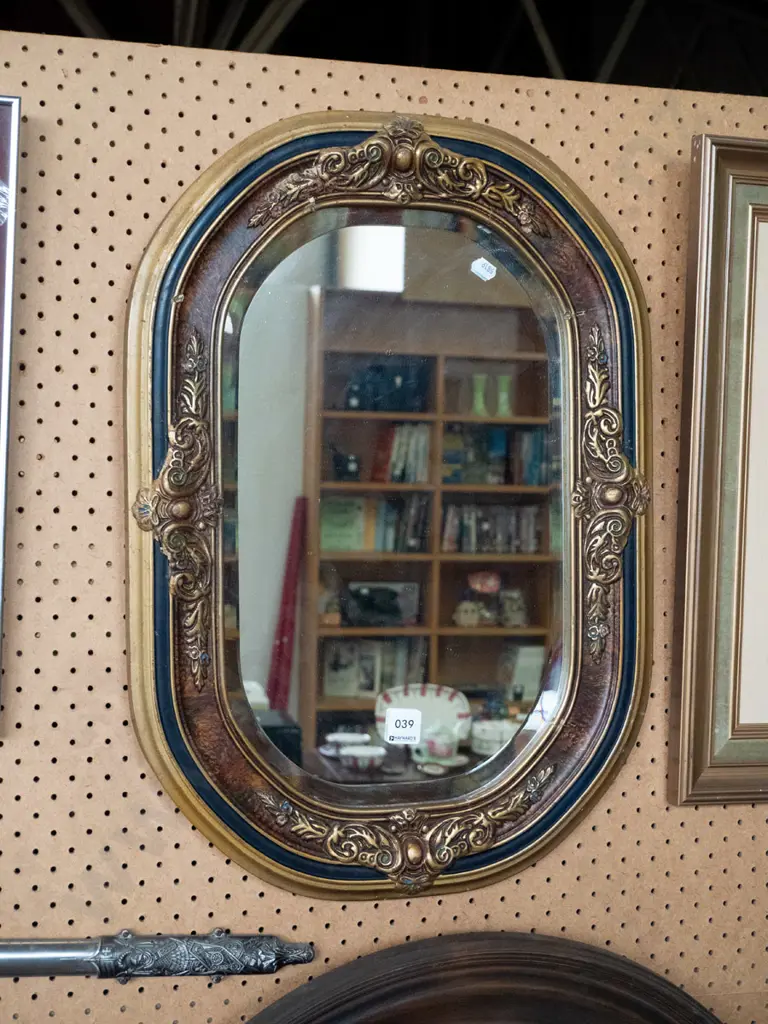 oval framed bevelled edge wall mirror Image 1++