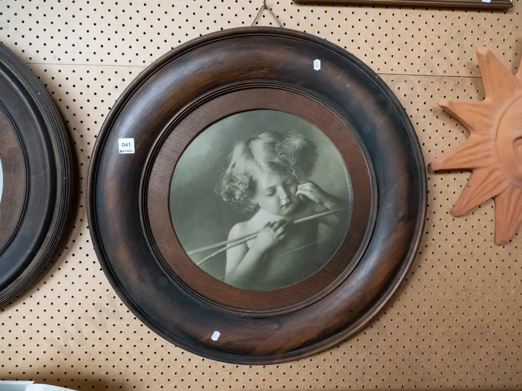 wood-framed round cupid print Image 1++
