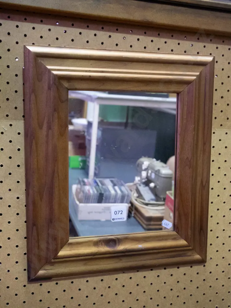 small wood-framed wall mirror Image 1++
