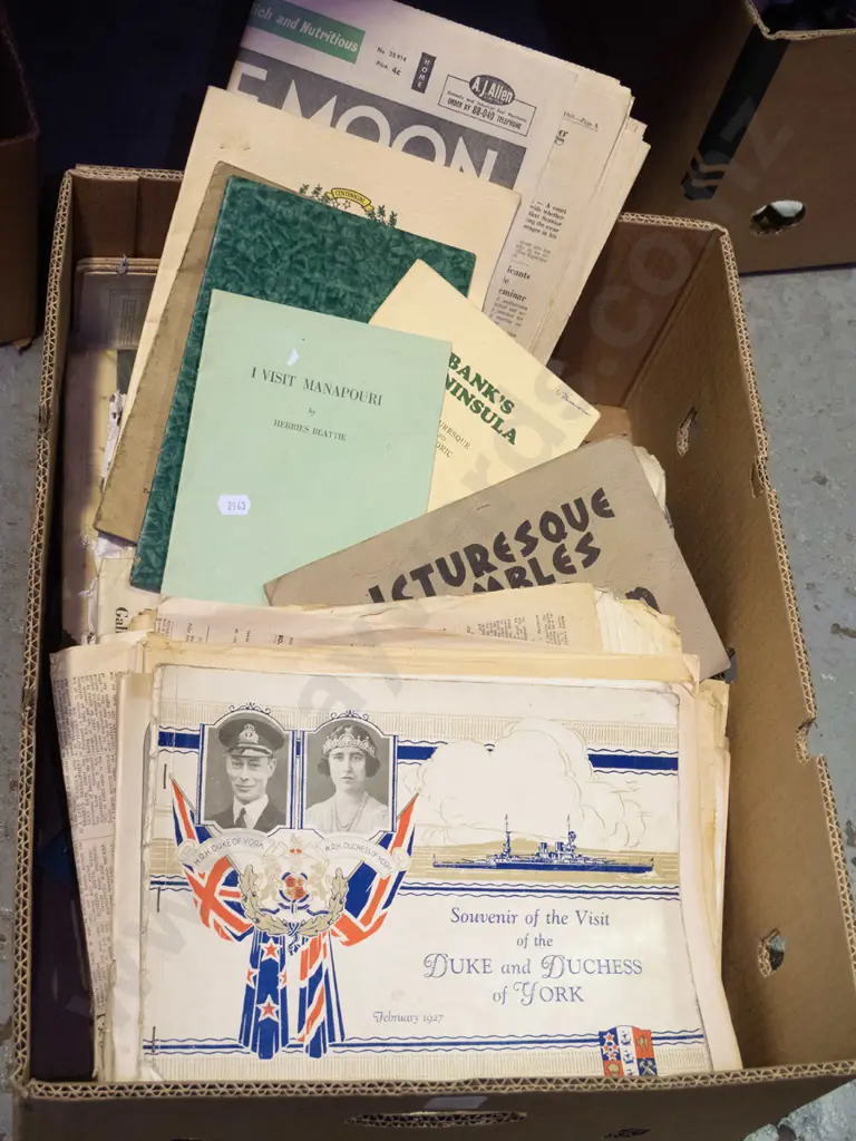 box of old newspapers, royal visit publications, local guides, etc. Image 1++