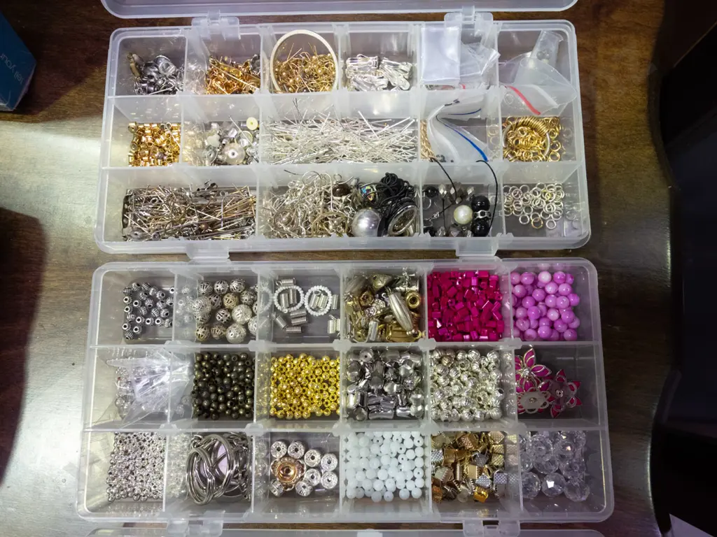 2 plastic organisers of various beads and jewellery making supplies Image 1++