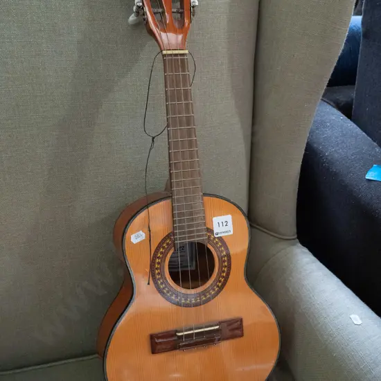 child's Sanchez guitar