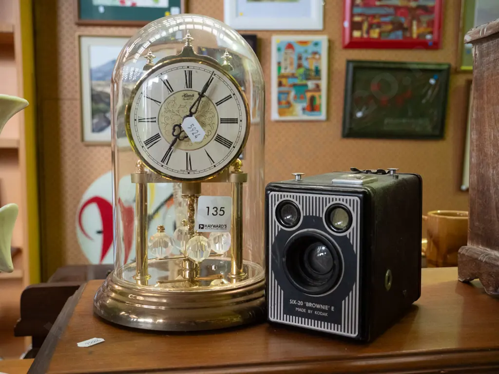 Kodak box camera and an anniversary clock Image 1++