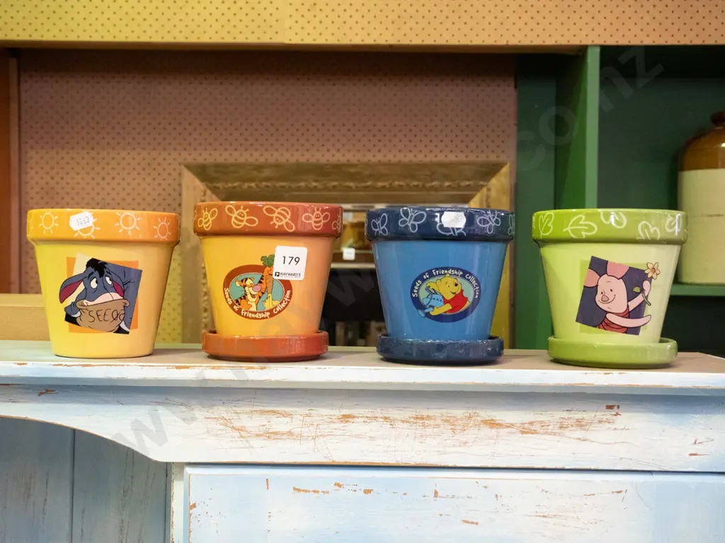 4 Winnie the Pooh planters, one missing tray Image 1++