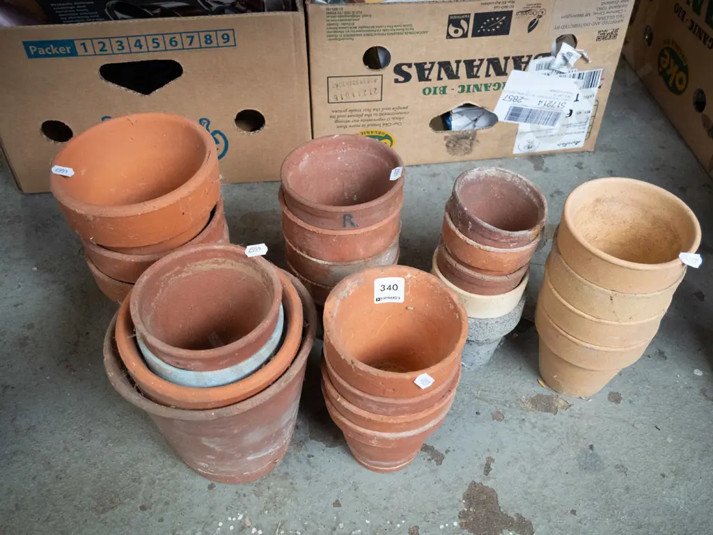 numerous terracotta garden planters Image 1++