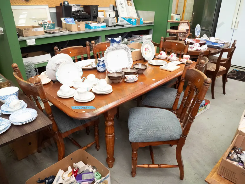 solid wood extending dining table and 6 upholstered chair, seat on one is loose, seats need a clean. H720 L1100 W820 Image 1++