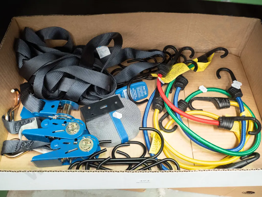 box of tie-downs and bungie cords Image 1++