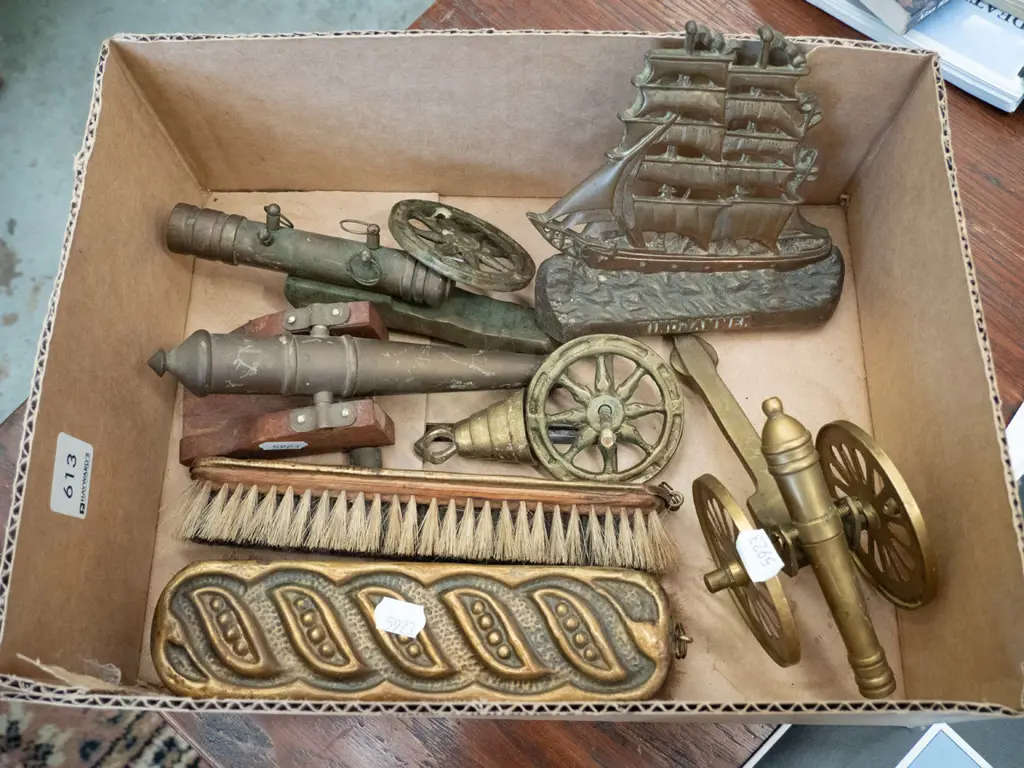 box; ornamental brass canons, clothes brushes etc Image 1++