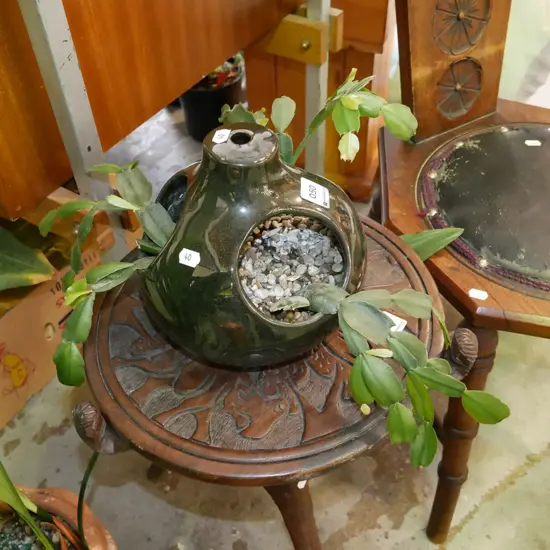 green glazed hanging planter and succulents