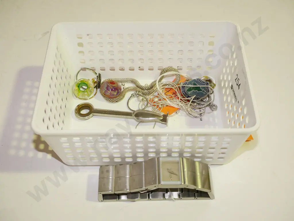 tray; wristwatch, necklaces, beads, cocktail stirrer etc Image 1++