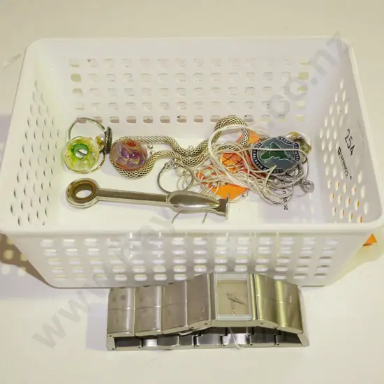 tray; wristwatch, necklaces, beads, cocktail stirrer etc