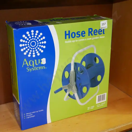 box of yet to be assembled hose reel