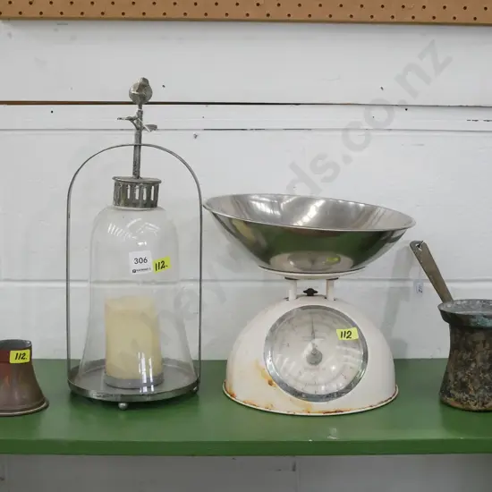 scales, copper pourers, candle lantern