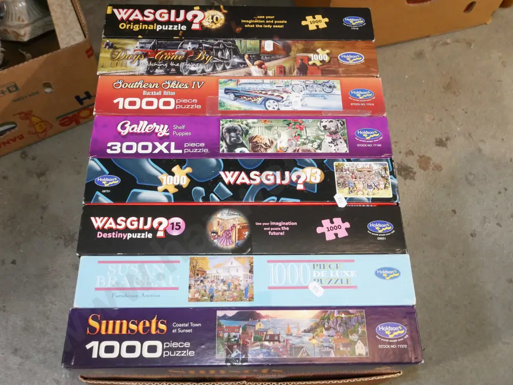box of wasgji puzzles etc Image 1++