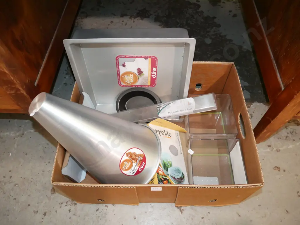 box of as-new kitchen items; baking tins, magnetic knife rack etc Image 1++