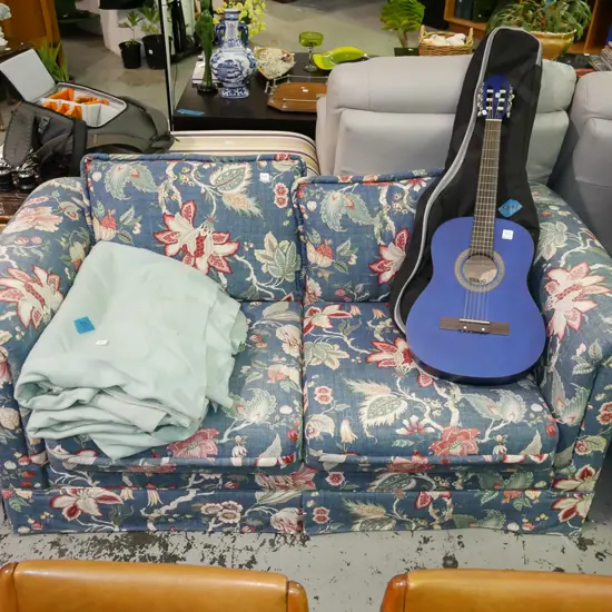 floral upholstered chesterfield settee - some fading