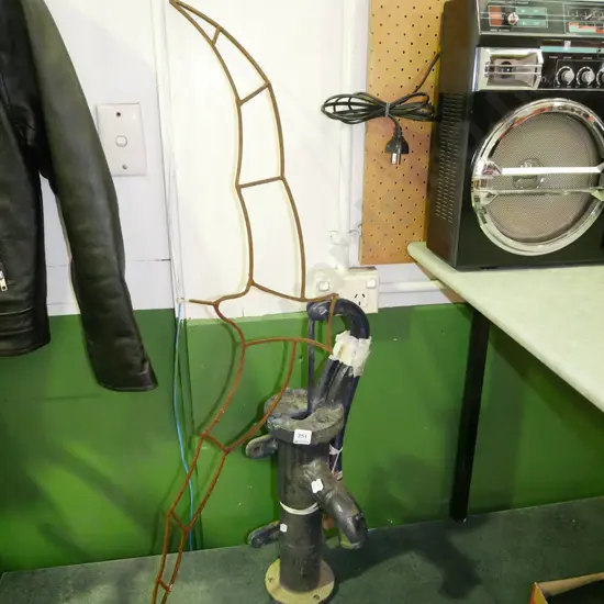 restorer's cow tail pump, metal bird figurine