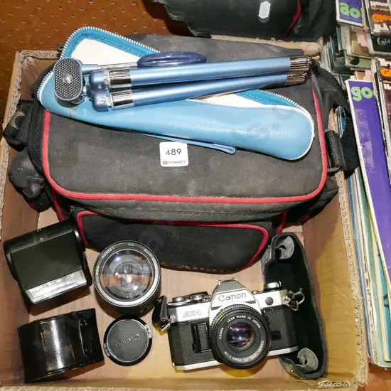 box; Canon Ae/1 film camera, lenses, flash, camera bag etc