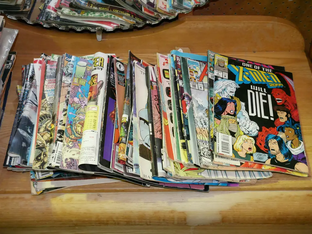 stack of comics Image 1++