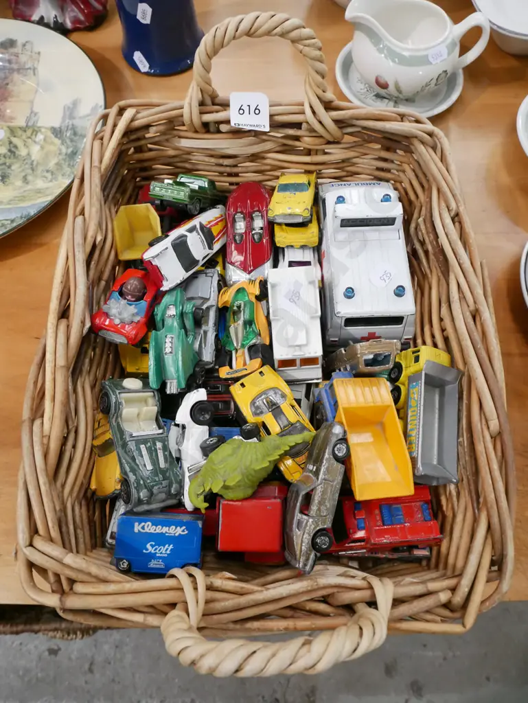 cane basket and toy vehicles Image 1++