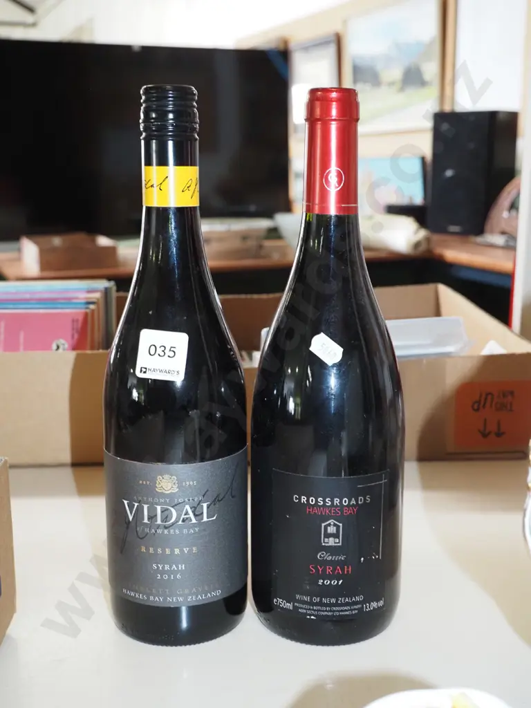 bottle of Vidal syrah 2016, bottle of Cross Roads syrah 2001 Image 1++