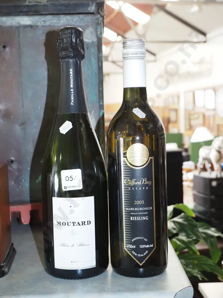 bottle of Clifford Bay 2003 reisling, bottle of French moutard champagne Image 1++
