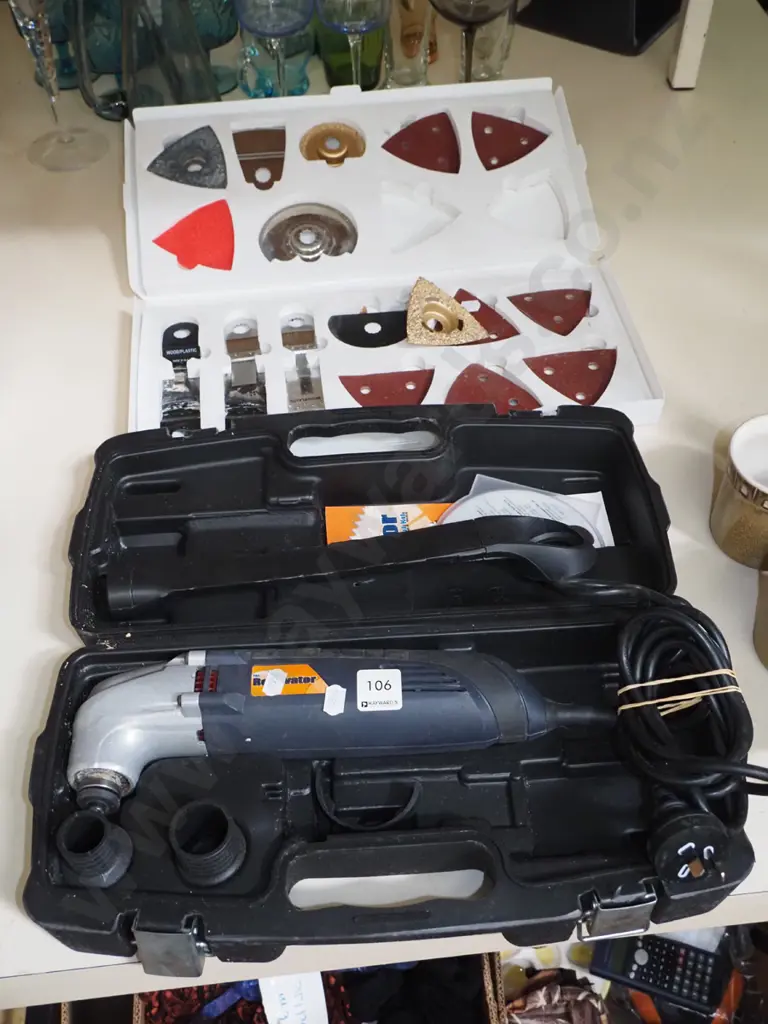 cased Renovator multi tool and accessories Image 1++
