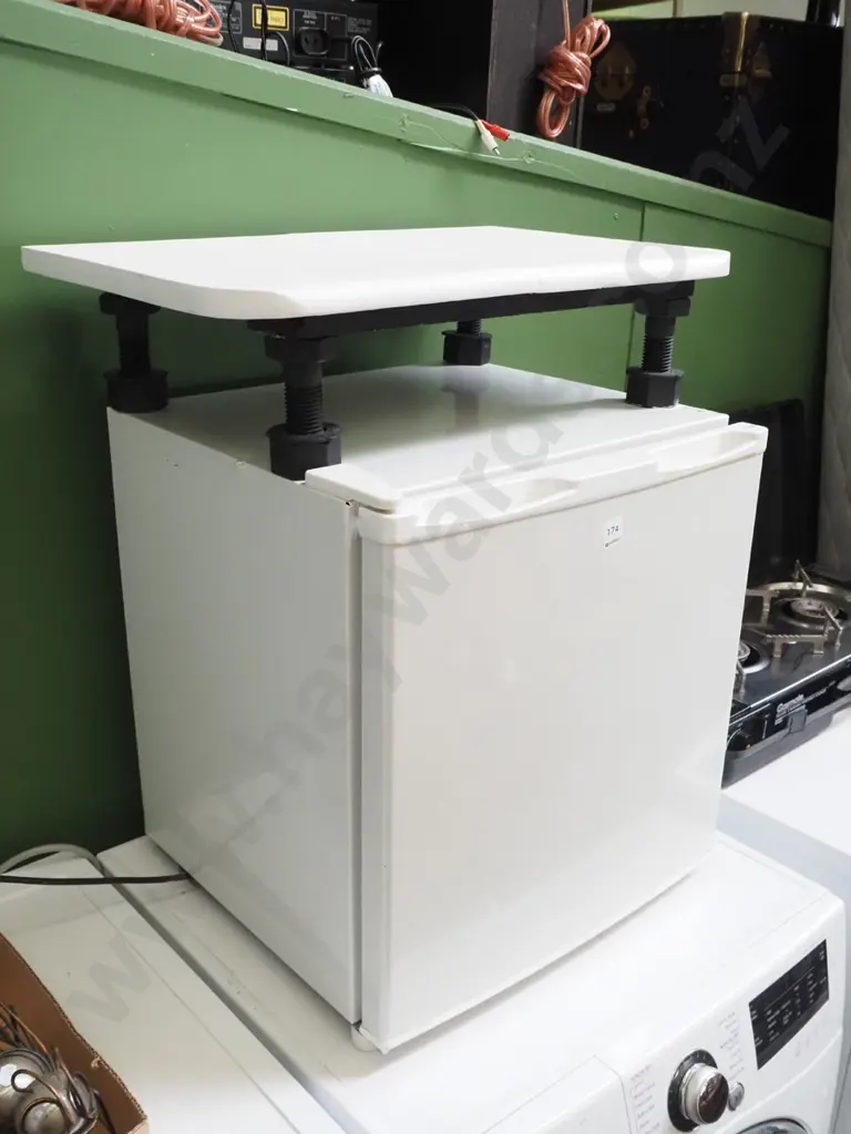 small underbench fridge - no interior shelves with attachment on top Image 1++