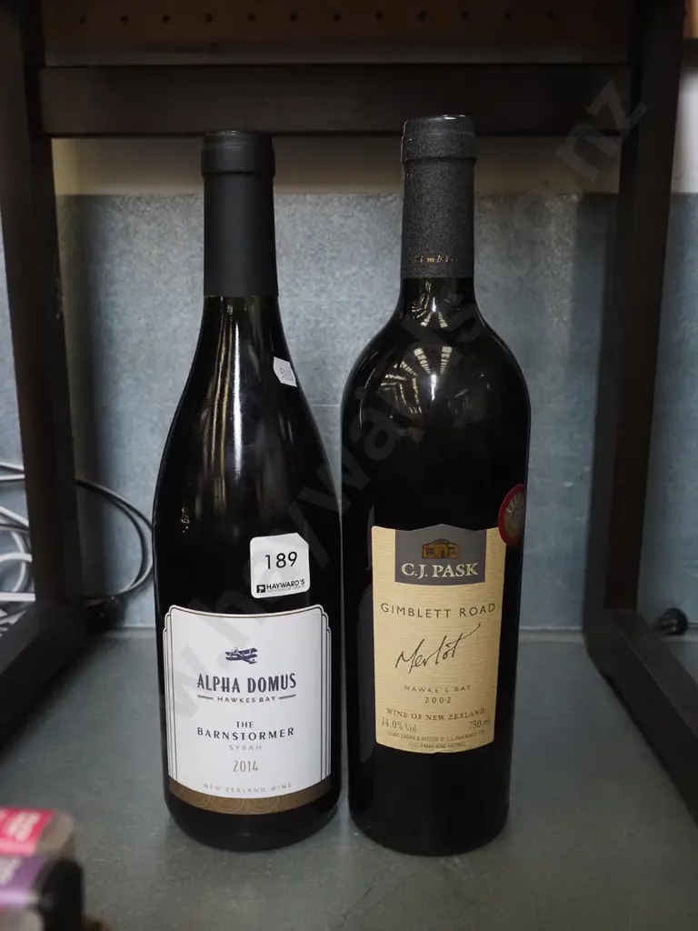 bottle of Alpha Domus 2014 syrah, Gimblett Road merlot 2002 Image 1++
