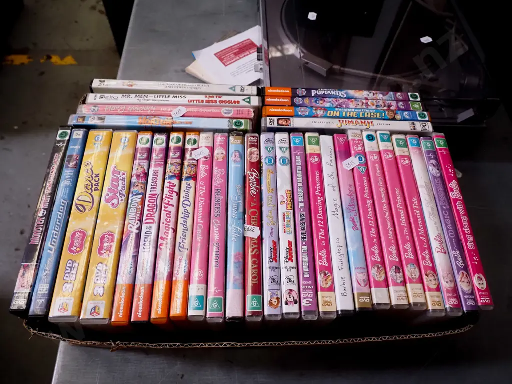 box of Barbie and other DVDs Image 1++