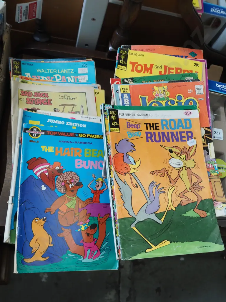 stack of comics Image 1++