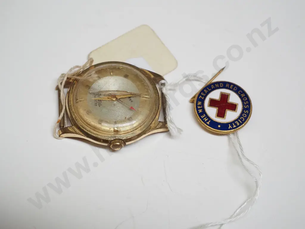 vintage wristwatch and Red Cross badge Image 1++