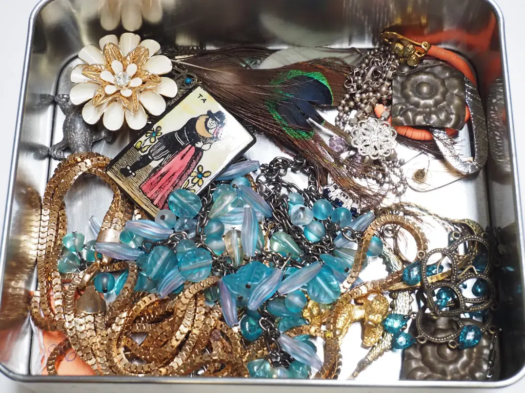 tin of costume jewellery Image 1++