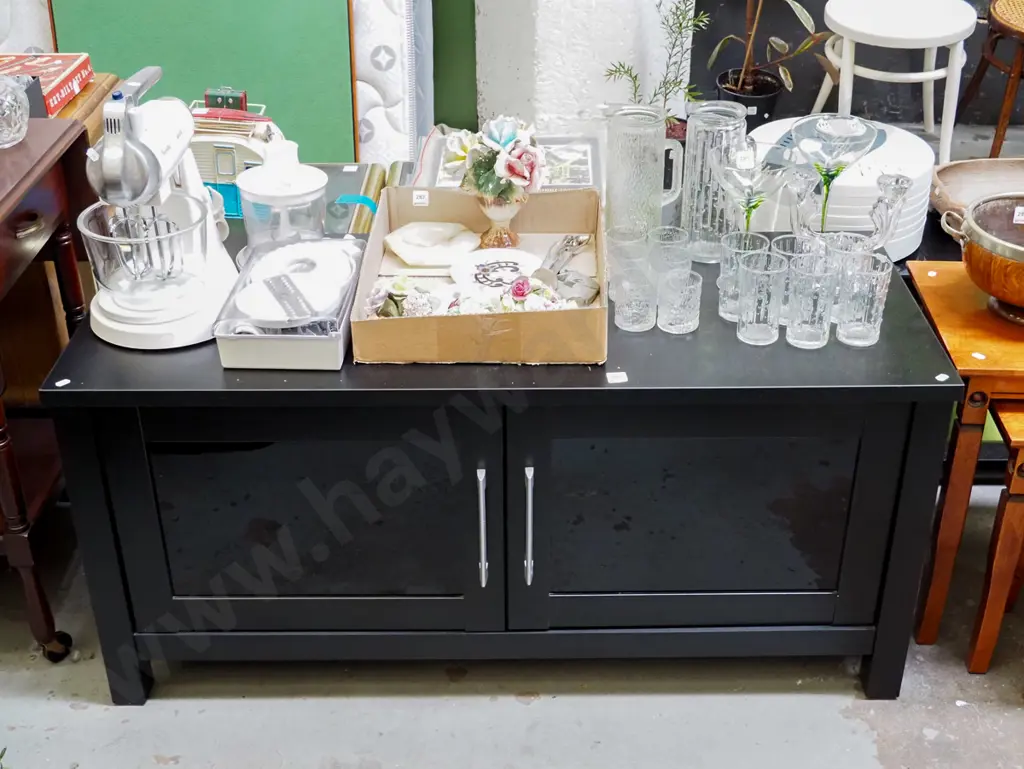 black melteca 2 door cupboard H-560 W-1210 D-500 Image 1++