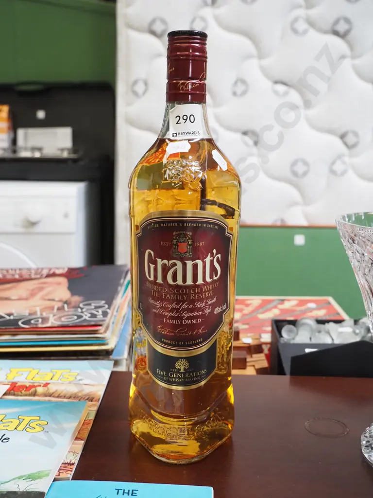 bottle of Grants 1L Scotch whisky Image 1++