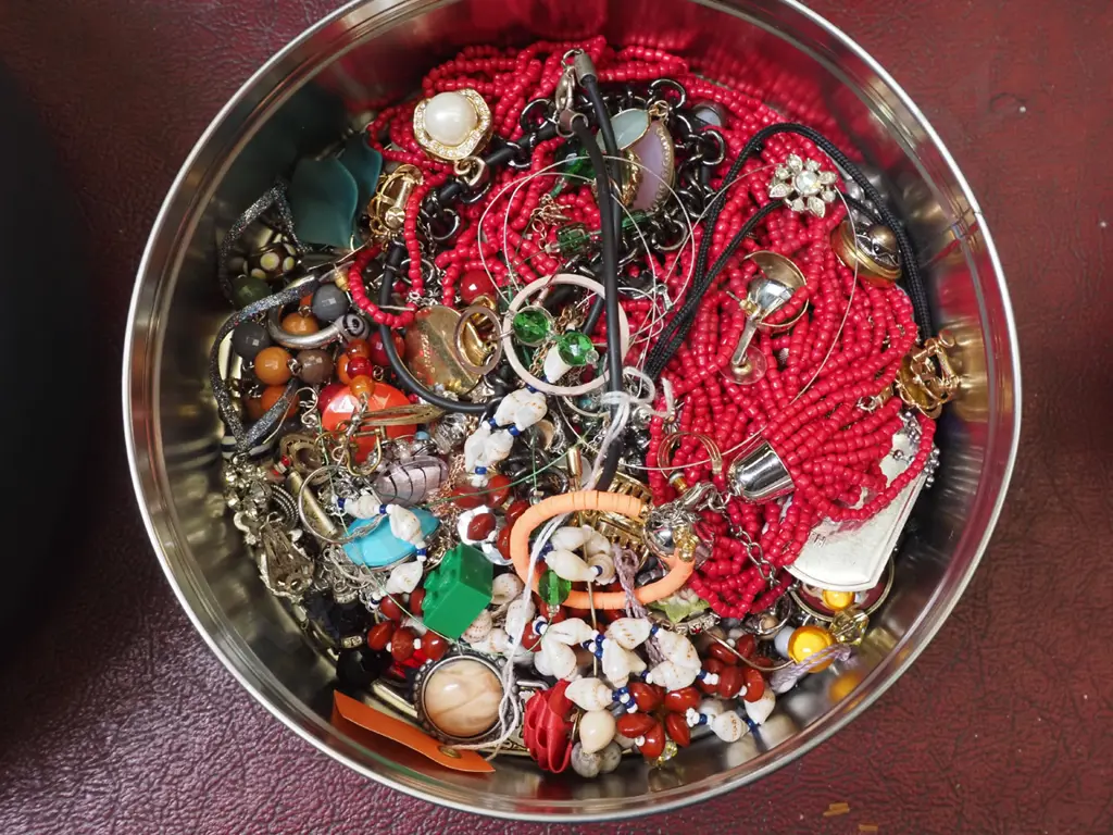 tin of costume jewellery Image 1++