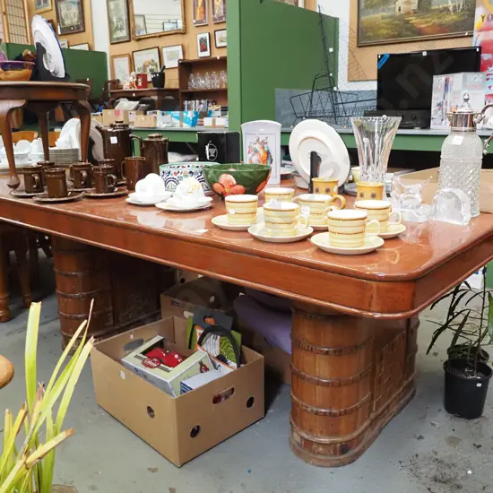 unusual oval twin pedestal based dining table with newly varnished top 