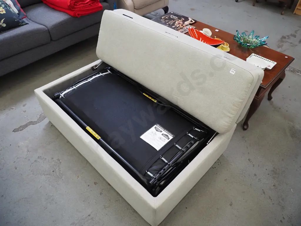 cream upholstered ottoman with pull out single bed - slight marking and fading Image 1++
