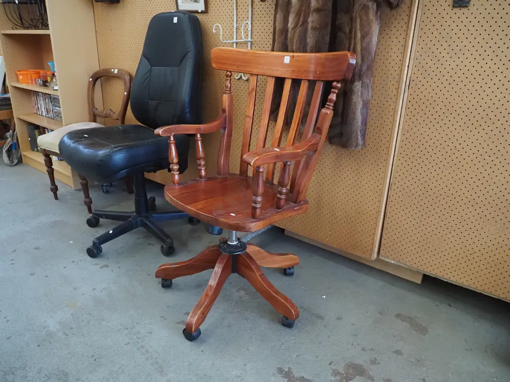 large wooden swivel armchair on casters Image 1++