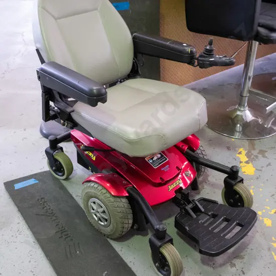 Pride Jazzy electric wheelchair with charger - working condition,comes with 2 rubber ramps