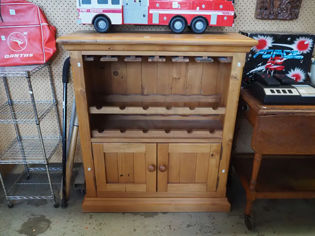 solid rimu wine rack/cabinet with 2 doors and stemmed glass storage Image 1++