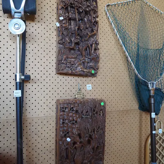 2x heavily carved Indonesian panels - green dots